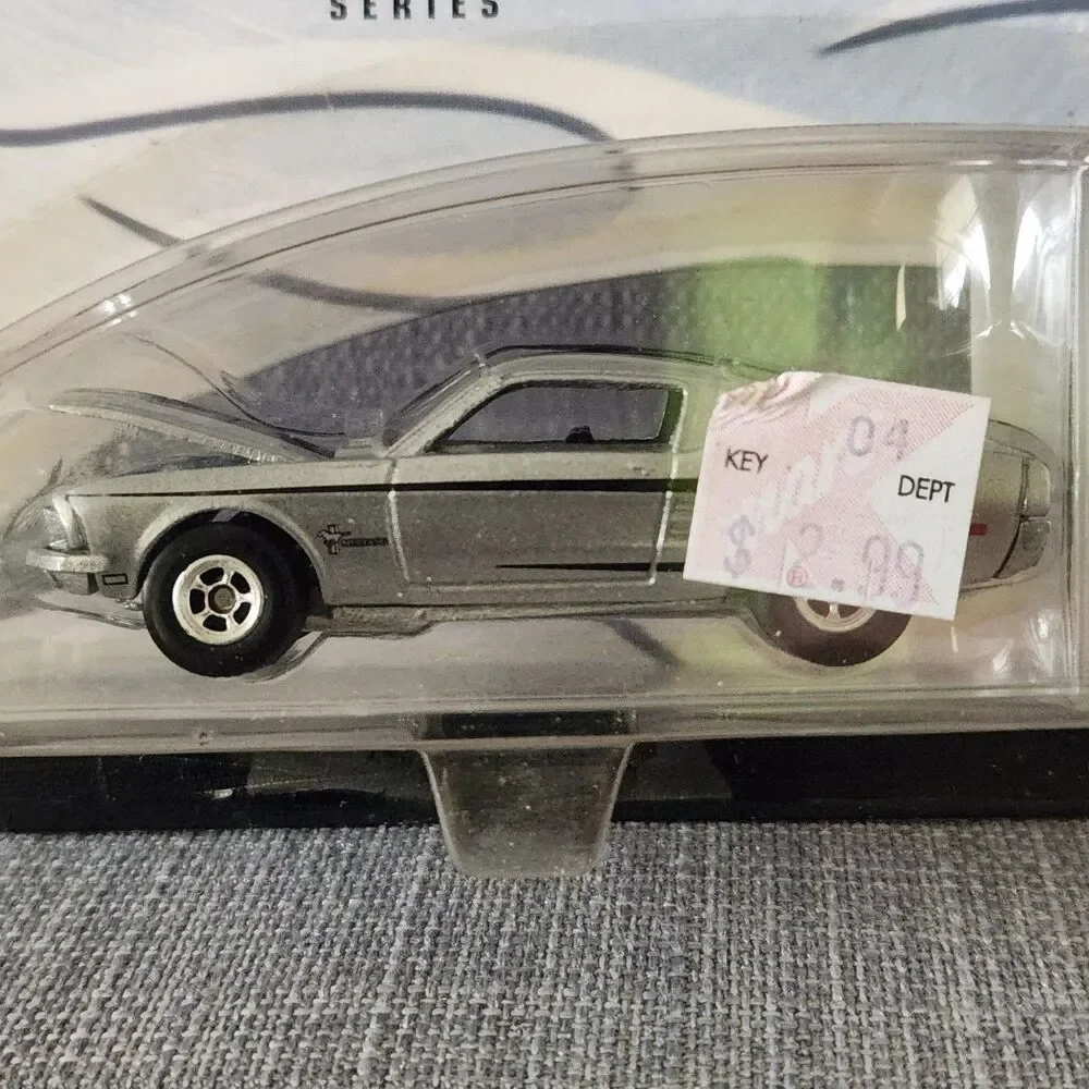 Lot of 2 NIP 100% Hotwheels Ford Series 65' and 67' Mustang 1:64 Die Cast Cars